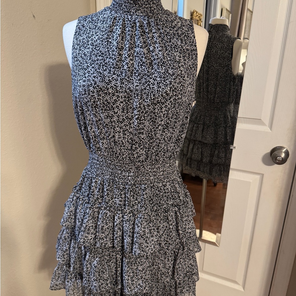 1. State Black and White Mini Dress - Tiered Ruffle Silhouette